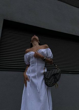 Неймовірно жіночна сукня міді з розрізом та ефектним бюстом6 фото