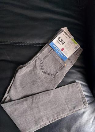 Дитячі джинси skinny graphit (8-9 років)