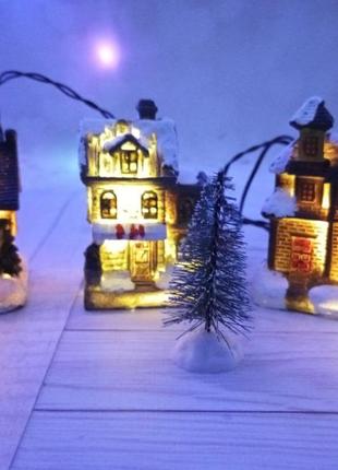 Різдвяні новорічні будиночки з підсвіткою.