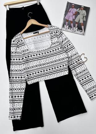 Білий топ із рукавами в принт