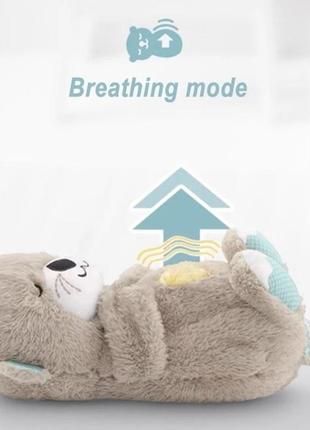 Інтерактивна іграшка для сну видра музичний з імітацією дихання2 фото