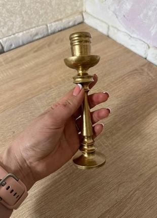 Продам подсвечник старый латунь или бронза не разъержусь в хорошем состоянии высота 18...