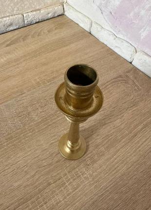 Продам подсвечник старый латунь или бронза не разъержусь в хорошем состоянии высота 18...