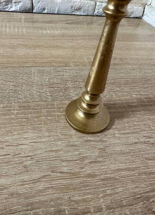 Продам подсвечник старый латунь или бронза не разъержусь в хорошем состоянии высота 18...