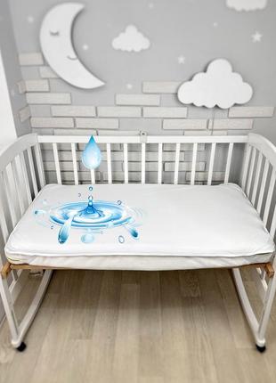 Непромокальний наматрацник на дитяче ліжечко 120х60см з білої махри та водонепроникної мембрани на р