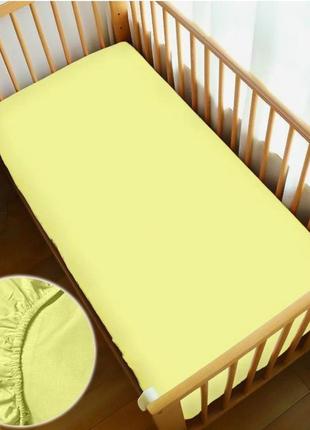 Махровая простынь на резинке в детскую кроватку1 фото