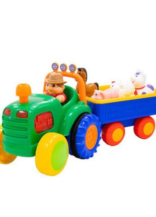 Розвивальна іграшка kiddi smart трактор з трейлером (063180)