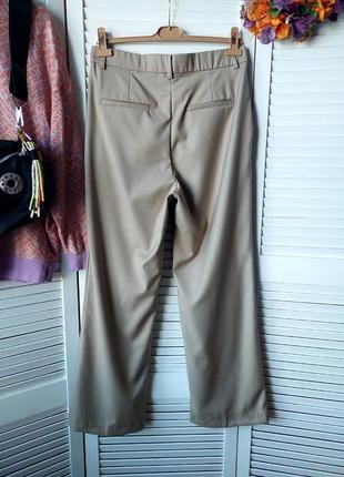 Штани штани палаццо широкі на високій талії посадкою з кишенями бежеві м-л h&amp;m4 фото