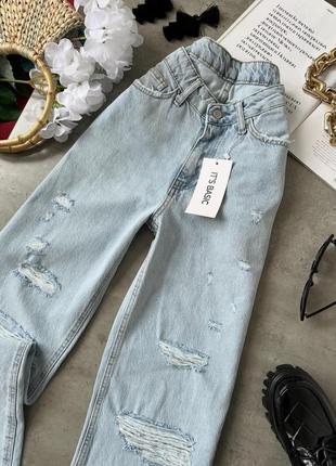 Рваные джинсы с высокой талией9 фото