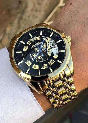 Мужские золотые механические наручные часы emporio armani / армани7 фото