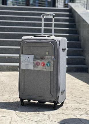 Облегченный  большой чемодан дорожный тканевый l на колесах  с подшипником6 фото