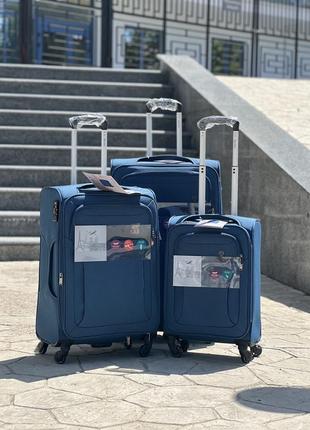 Полегшена середня валіза дорожня тканинна m nuri на колесах  з підшипником