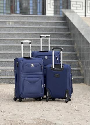 Средний чемодан дорожный тканевый m польша на колесах wings с подшипником4 фото