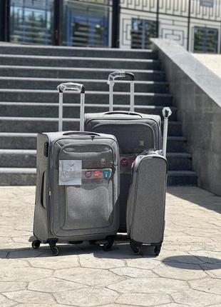 Полегшена середня валіза дорожня тканинна m nuri на колесах  з підшипником2 фото
