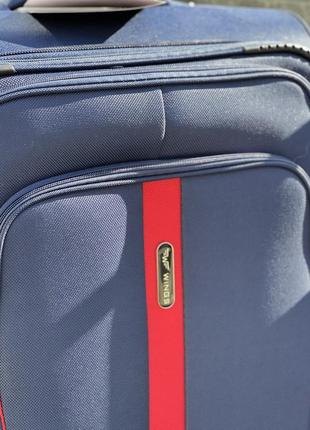 Средний чемодан дорожный тканевый m польша на колесах wings с подшипником7 фото