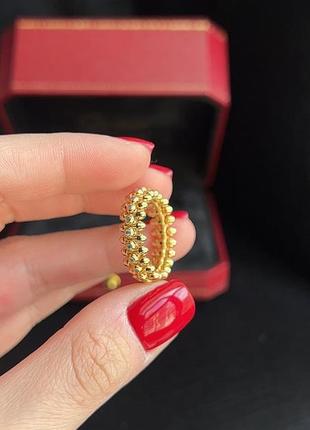 Брендовое кольцо в лимонном золоте с камушками2 фото