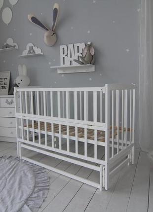 Кровать детская baby comfort лд2 с маятником белый3 фото