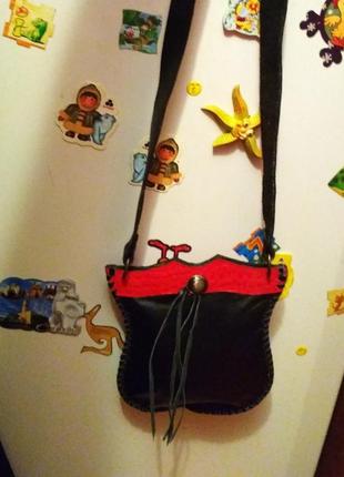 Маленька шкіряна сумочка