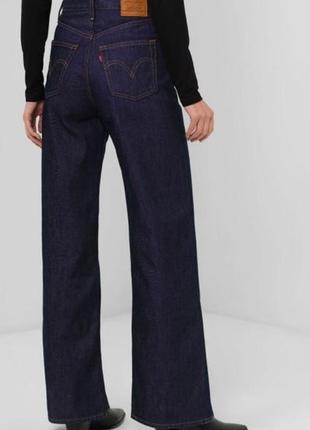 Джинсы levis,темно синего цвета,32 размера,на высоком росте,очень строго,джинс плотный,не тянется