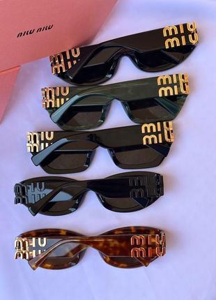 Сонцезахисні окуляри miu miu 20245 фото