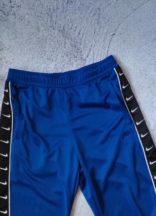 Мужские спортивные штаны с лампасами nike sportswear pant - indigo tech4 фото