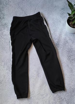 Мужские спортивные штаны nike skinny tribute joggers tech7 фото