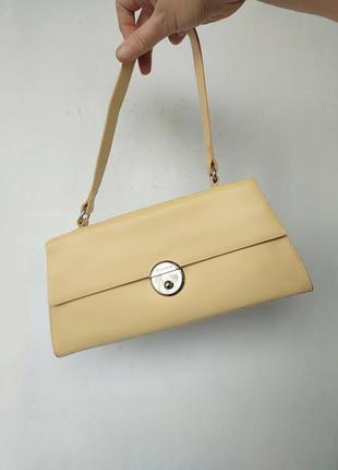 Брендовий шкіряна сумочка coccinelle,італія оригінал1 фото