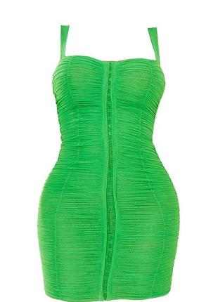 Ярко-зеленое облегающее платье с сетчатыми
рюшами та вушками2 фото