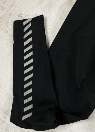 Безпека та комфорт: чорні рефлективні компресійні штани nike running2 фото