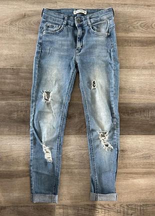 Потертые джинсы1 фото