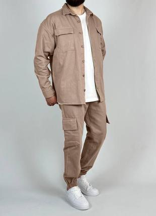 Солідний чоловічий джинсовий кежуал комплект сорочка з кишенями і штани брюки карго1 фото