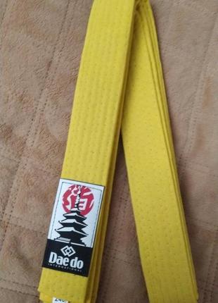 Жовтий пояс для єдиноборств, карате, дзюдо, айкідо, тайквондо.