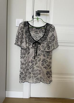 Невагома прозора блуза