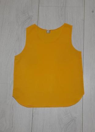 Блуза без рукавів,  насиченого жовтого кольору.3 фото