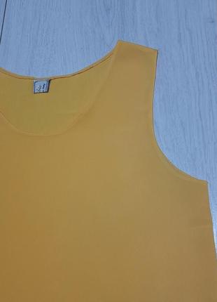 Блуза без рукавів,  насиченого жовтого кольору.5 фото