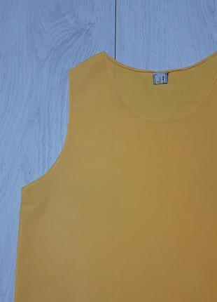 Блуза без рукавів,  насиченого жовтого кольору.6 фото