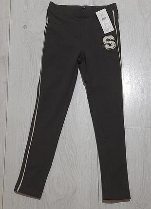 Штани (лосіни) темно-сірого кольору (графіті). нові. теплі. по...