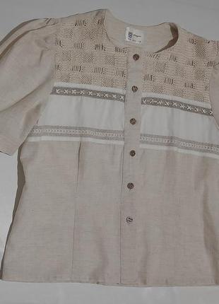 Блузка (блуза), літня, з короткими рукавами, спереді декорована.6 фото