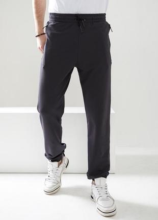 Мужские спортивные штаны с карманами на молнии базовые качественные2 фото