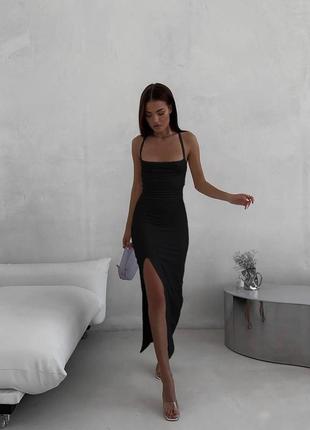 Спокуслива облягаюча сукня-міді з відкритою спиною5 фото