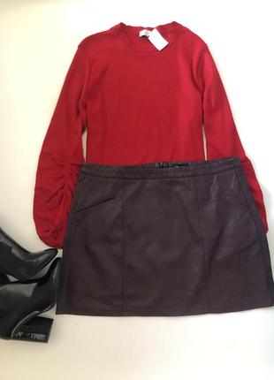 Кожзамовая спідничка з кишеньками