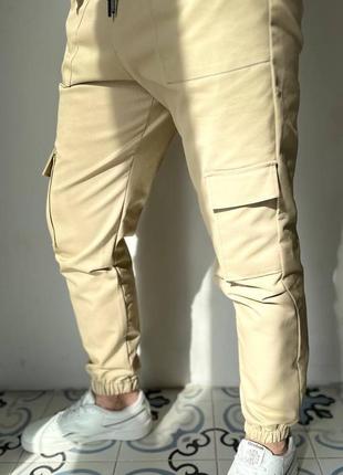 Чоловічі коттонові штани джогери карго з бічними кишенями2 фото