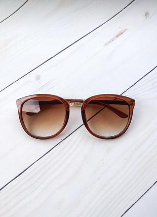 Большие коричневые сонцезащитные очки1 фото