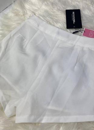 Нові жіночі білі шорти з паєтками на високій посадці хс4 фото