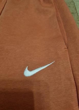 Классные спортивные штаны nike essential fleece3 фото