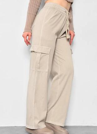 Стильні прямі жіночі штани з боковими кишенями повсякденні жіночі штани з накладними кишенями штани на резинці в поясі7 фото