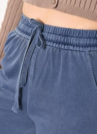 Стильні прямі жіночі штани з боковими кишенями повсякденні жіночі штани з накладними кишенями штани на резинці в поясі4 фото