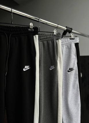 Чоловічі спортивні штани nike на весну світло-сірому кольорі premium якості, стильні та зручні штани на кожен день10 фото