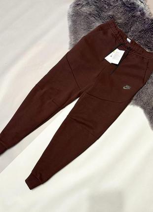 Новые мужские брюки nike tech fleece оригинал с и хл размер3 фото