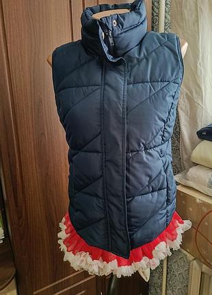 Жилетка нова.